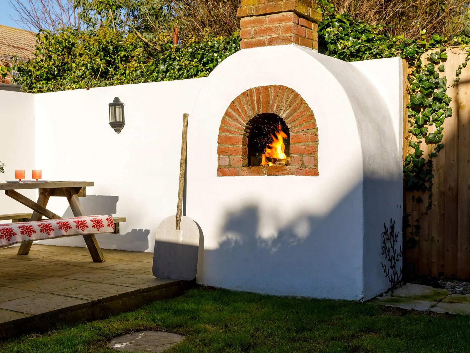 Fire up the pizza oven for cozy evenings