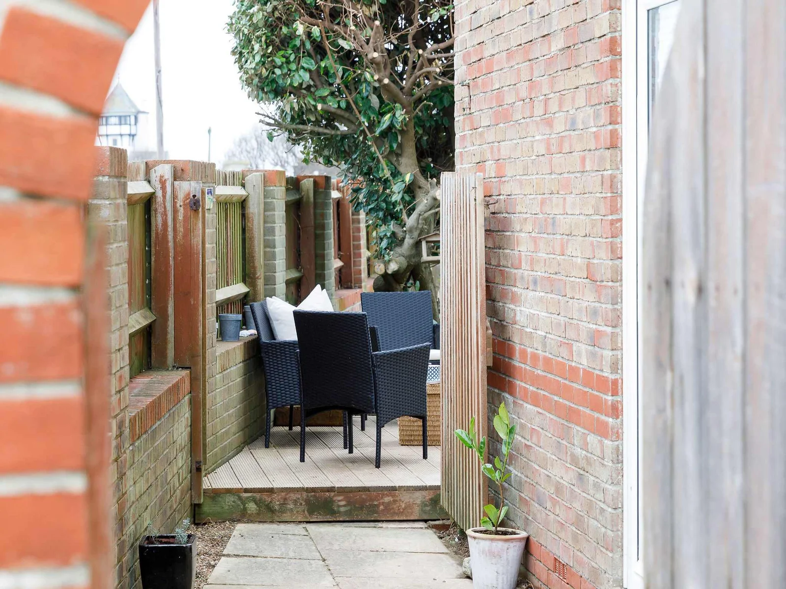 You can reach the back garden via a side gate, perfect for coming off the beach.