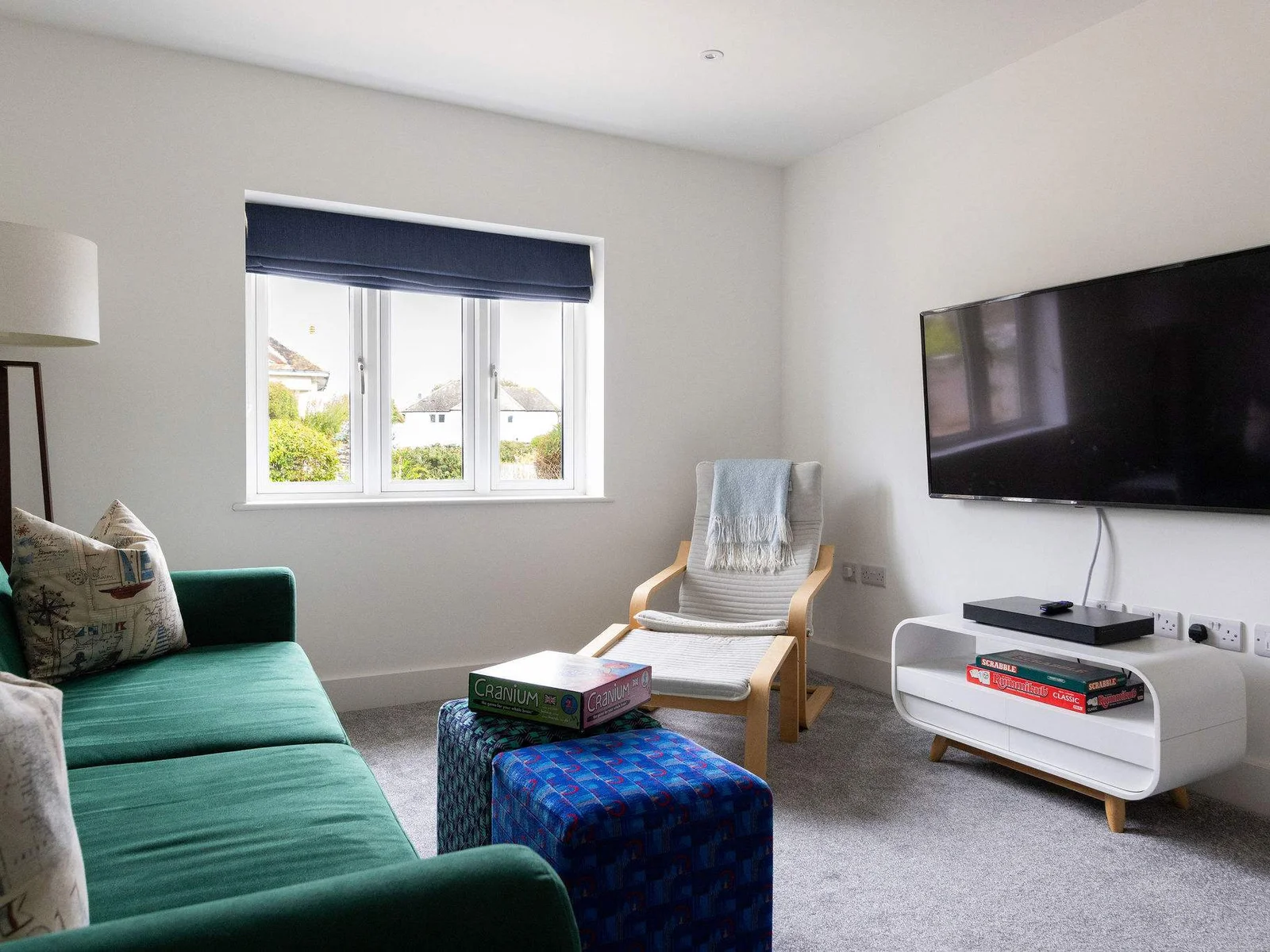 A cosy second sitting room made for movie nights