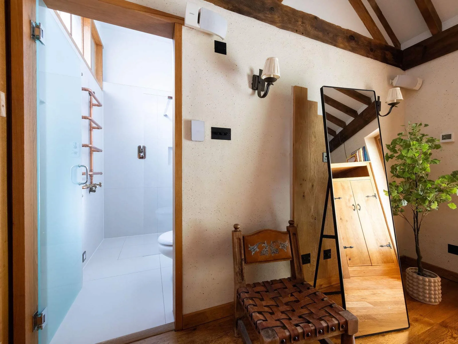 Fresh, modern shower facilities with beautiful copper detailing.