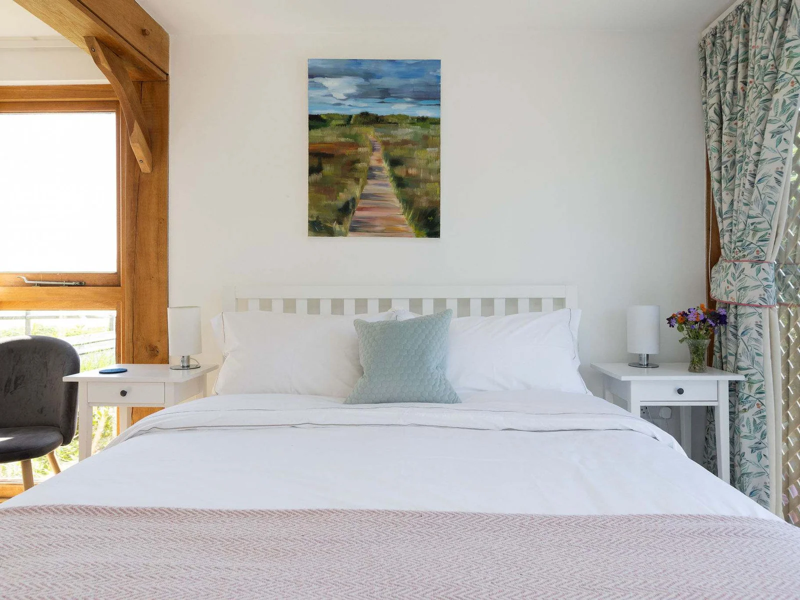 Bright and airy bedroom with beautiful view.