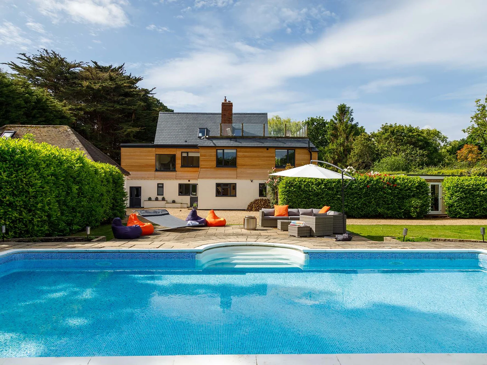 Luxury at Lindfields. The heated pool is to the rear of the home. The grounds are completely private and not overlooked by neighbours.