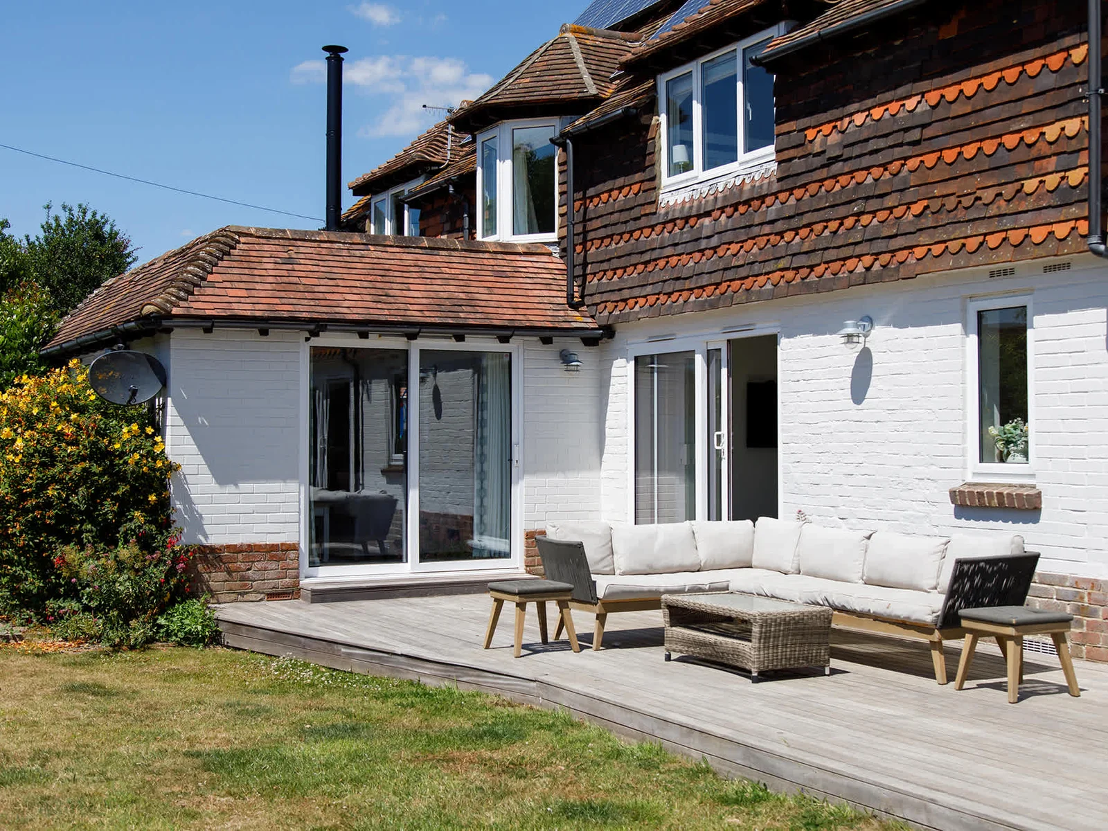 The outside seating on the decking is off the kitchen and a lovely spot to soak up the sun.
