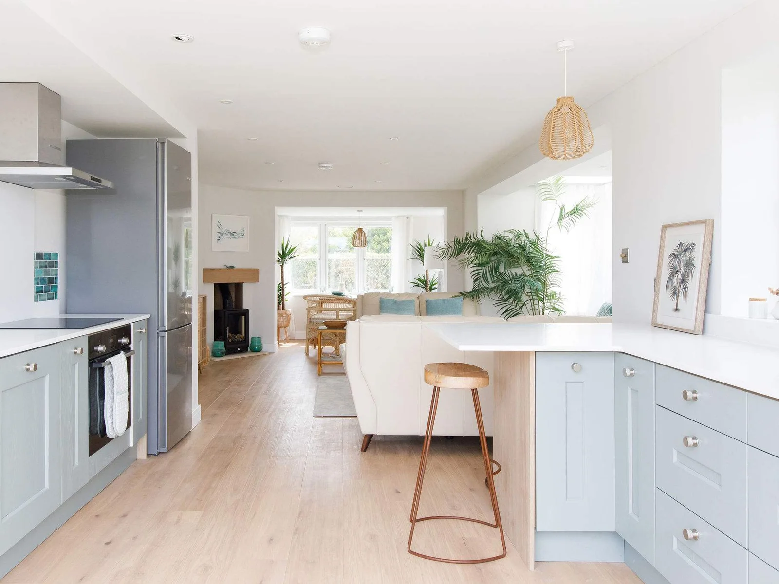 The open plan kitchen with breakfast bar