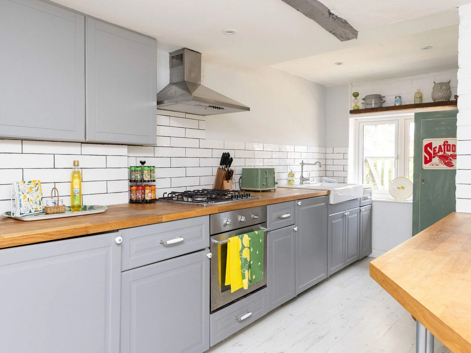 The cottage has a stylish & colourful kitchen.