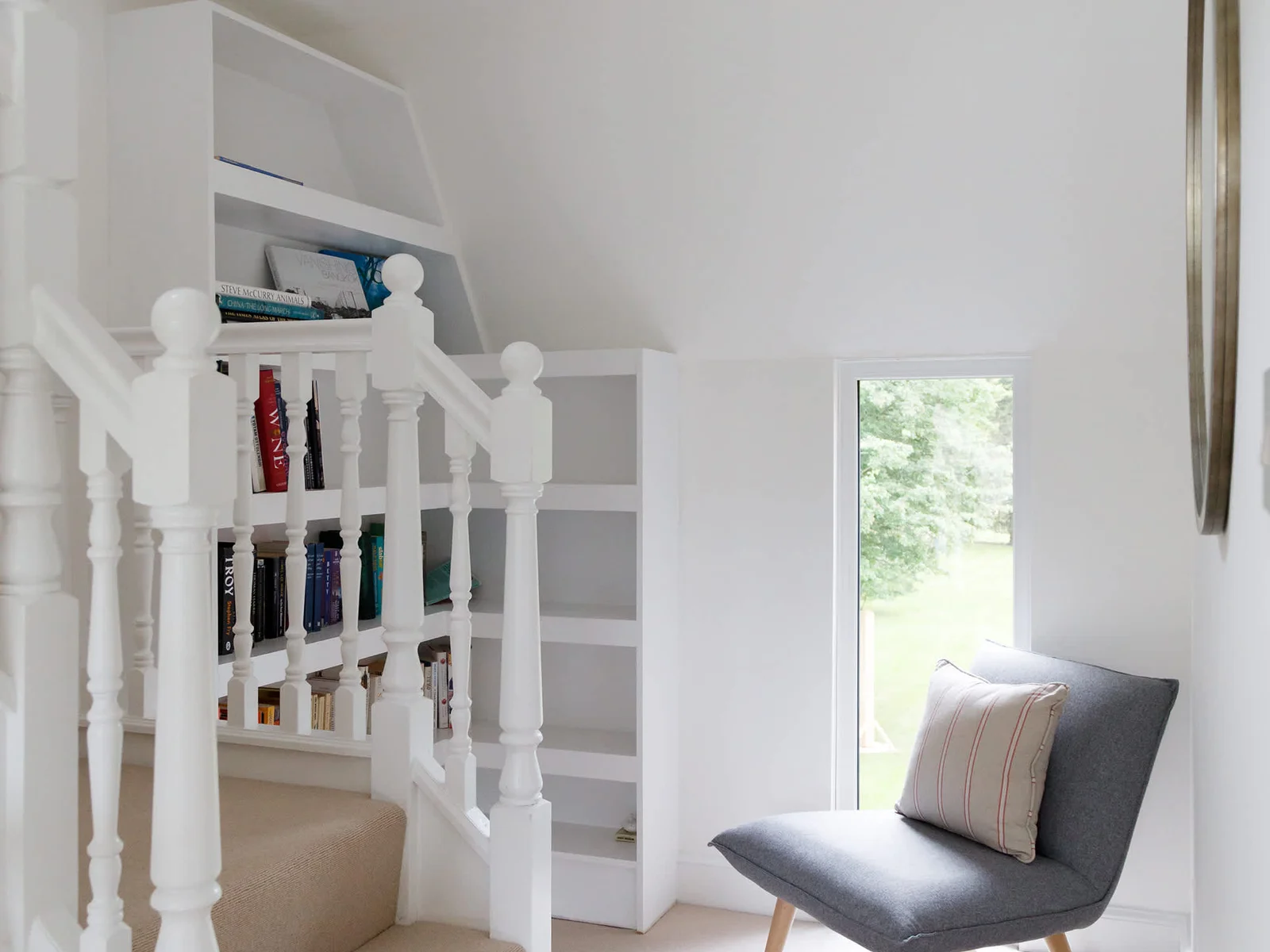 You'll find plenty of reading in the home, as well as plenty of places to sit.