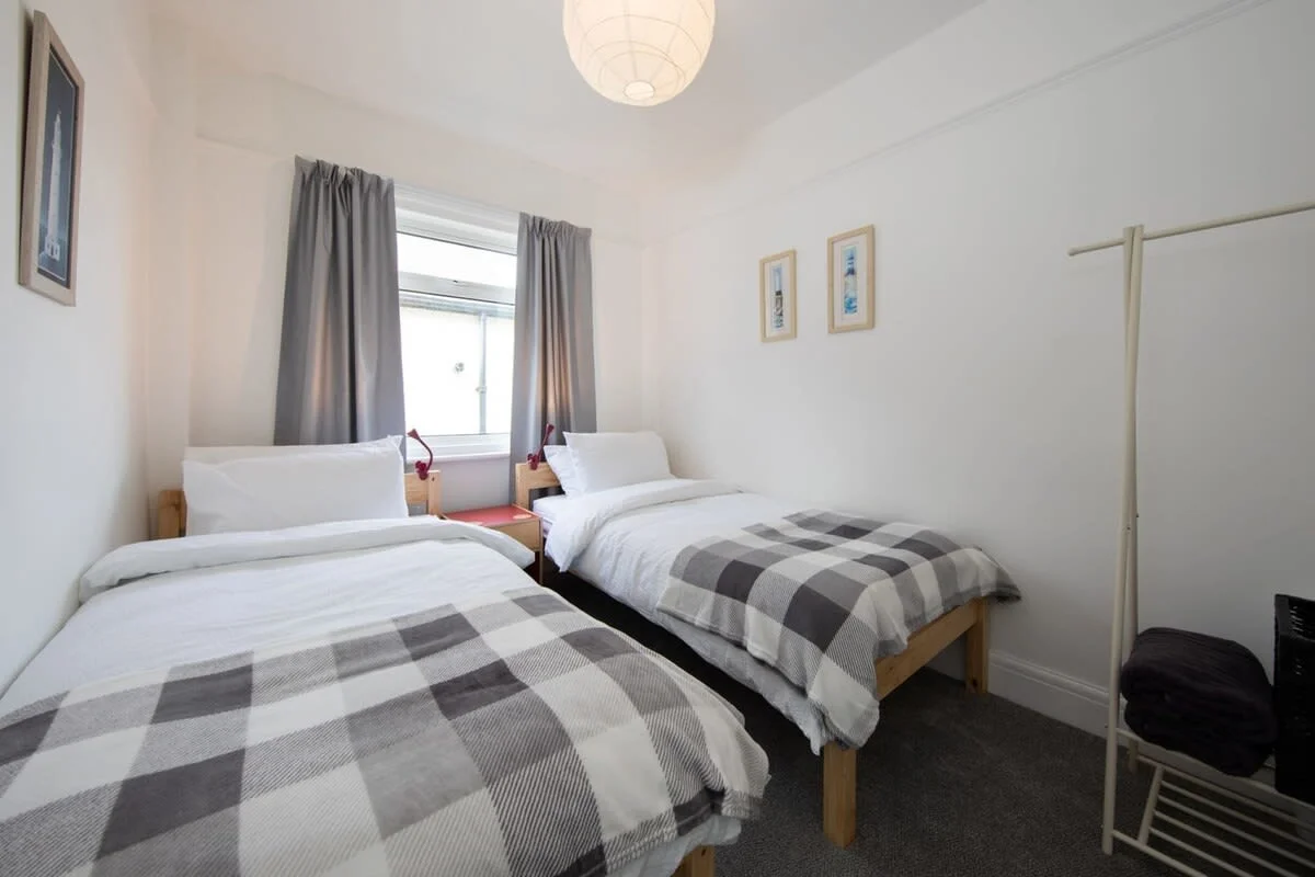 The cosy bedroom four with two twin beds