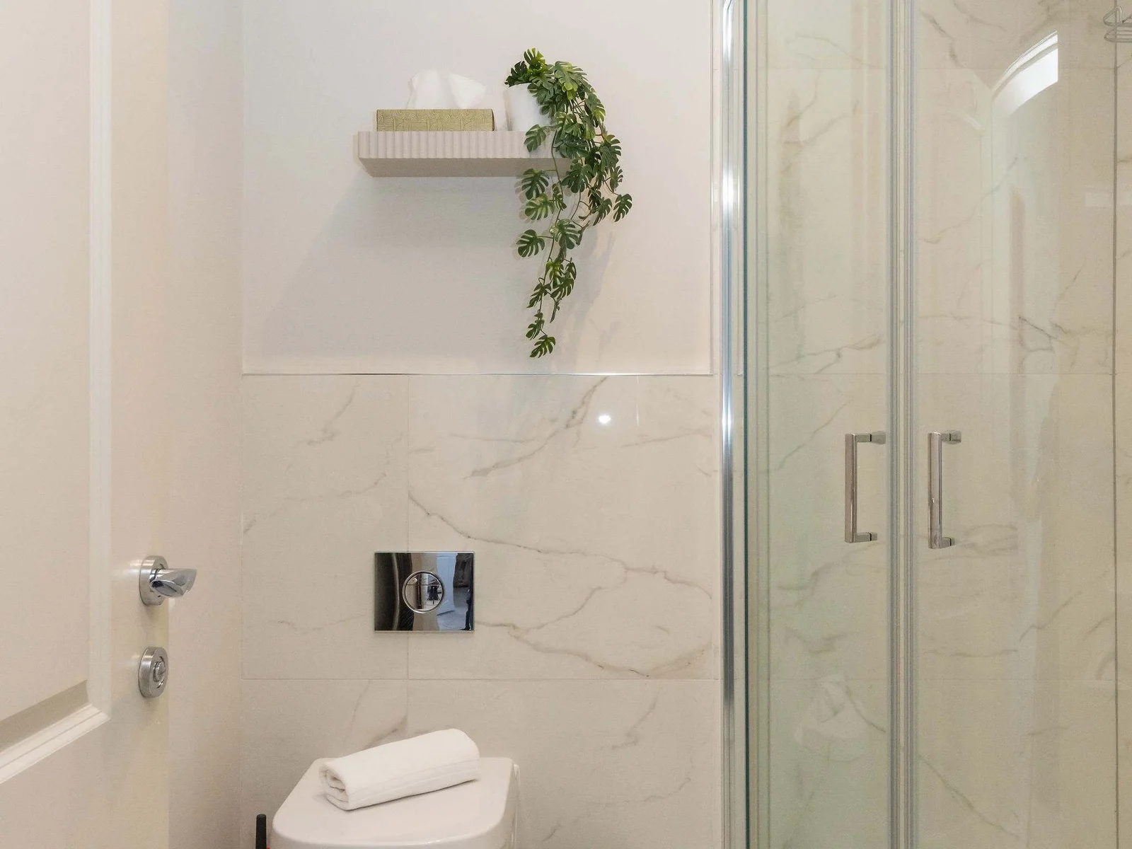 Clean, modern bathrooms complete this stylish and well-presented seafront apartment.