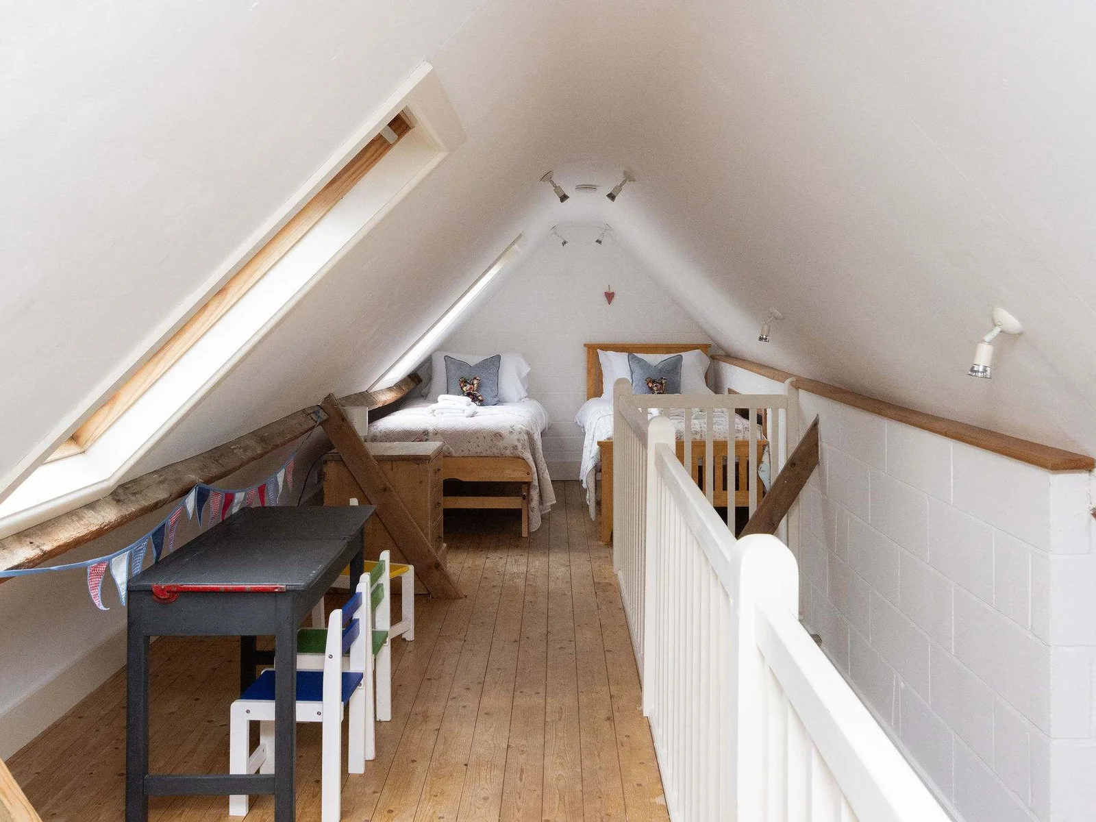 The mezzanine bedrooms in both The Dairy and Wren Barn is open to the space below and accessed via stairs.