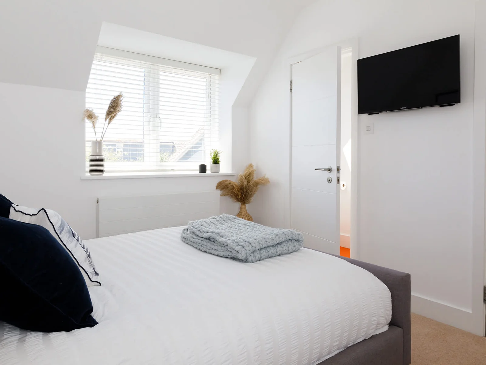 An abundance of carefully picked details create a unique bedroom ambiance