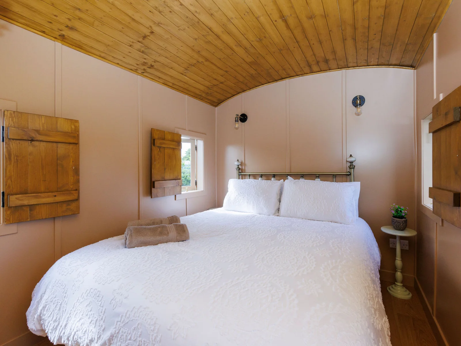 Discover two beautifully decorated bedrooms, oozing vintage charm and rustic accents.