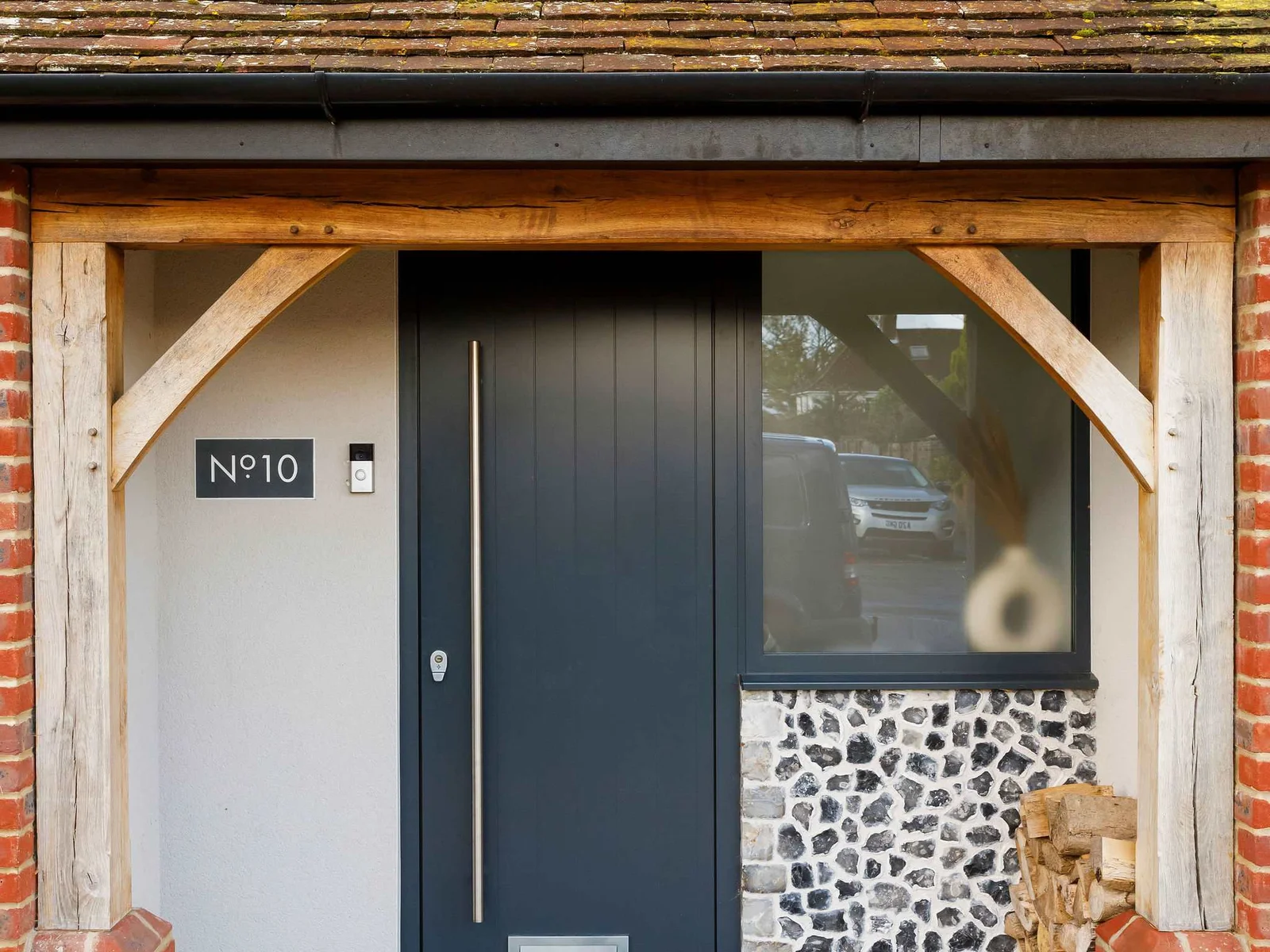 A covered porch entrance provides a welcoming gateway into the property.