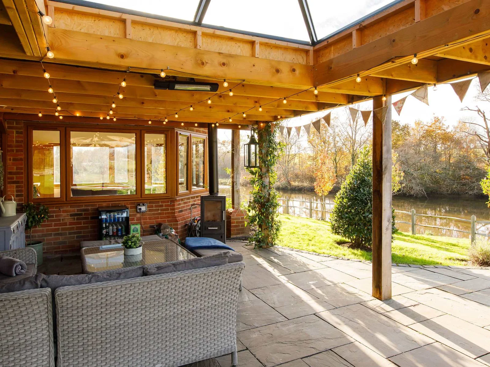 This 4000 sq ft retreat is designed to offer a unique blend of modern elegance and serene riverfront living.