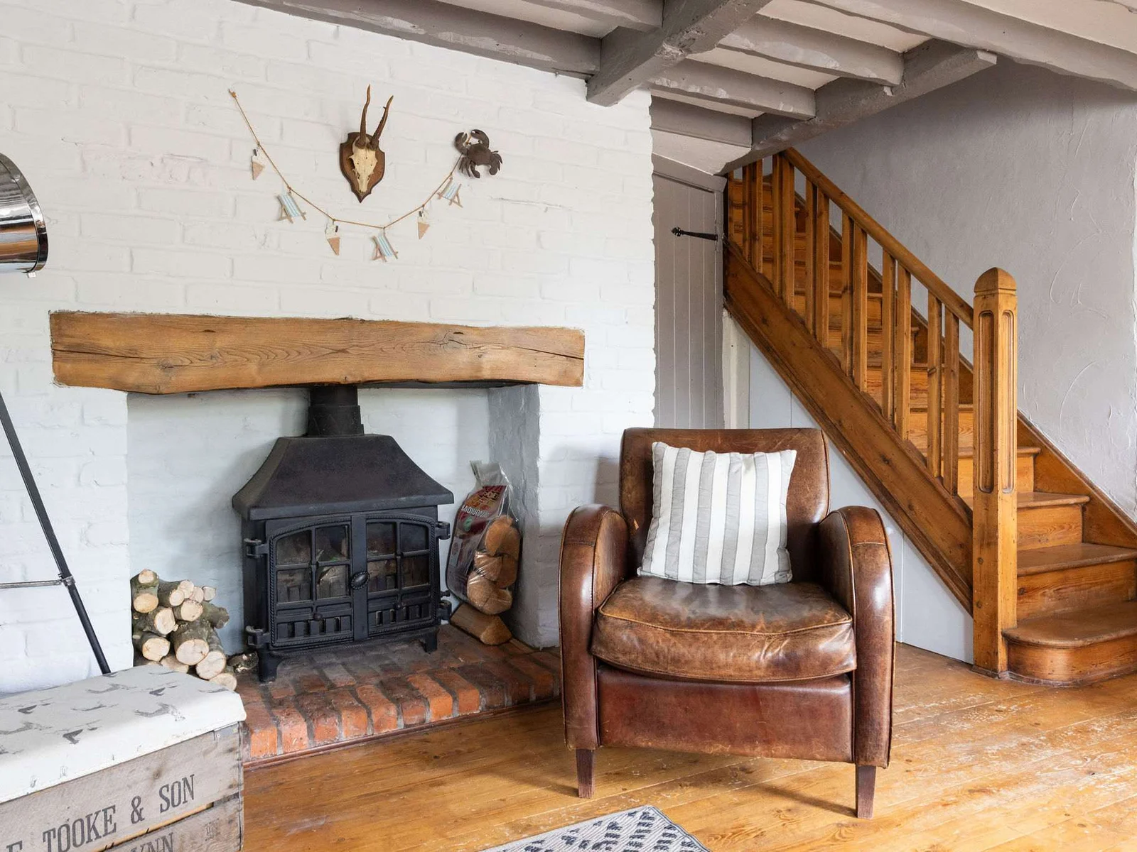 Full of character features throughout, such as exposed beams, wooden floors and staircase!