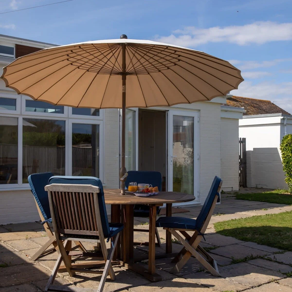 Soak up the sun, or seek shade under the parasol.