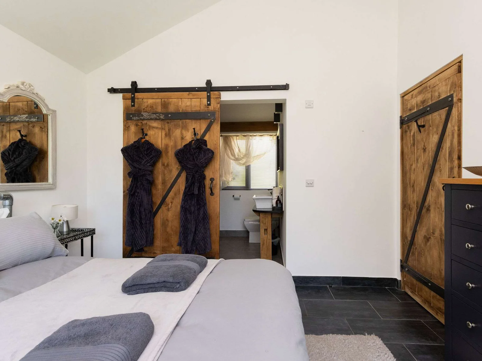 Experience ultimate comfort in this beautifully furnished bedroom complete with a convenient ensuite bathroom.