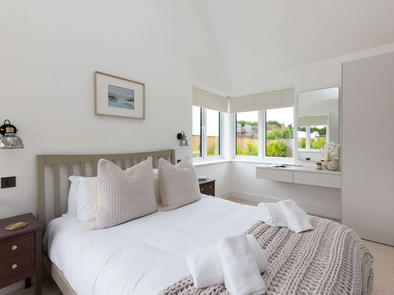 Bright bedroom with bay window and countryside views