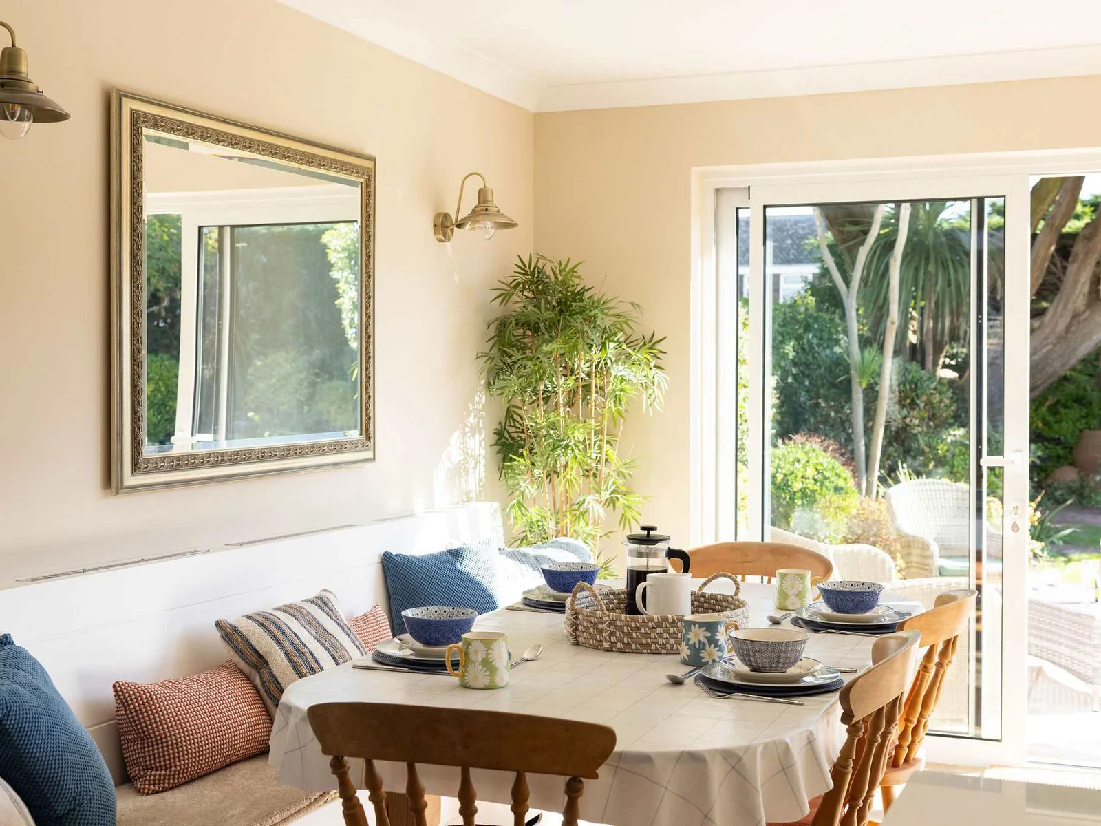 Open up the patio doors and allow the natural sunlight to flood in.