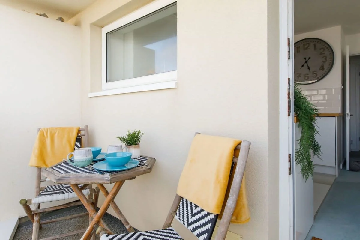 Enjoy the sunset with a cold drink on your own private balcony.