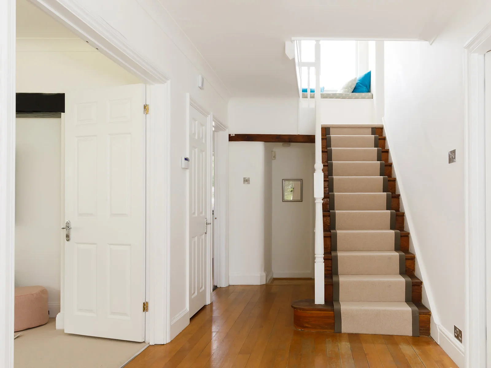 The large entrance hall and staircase leads to 5 beautiful bedrooms.