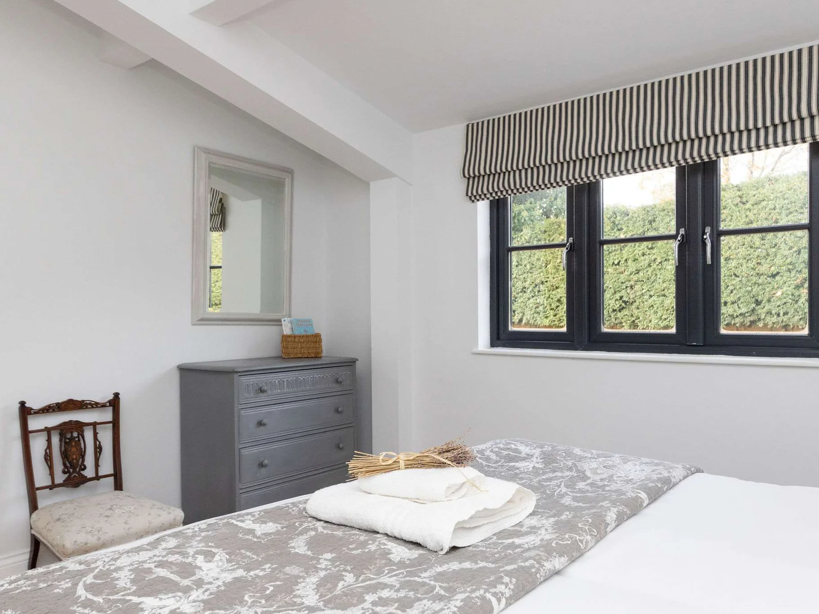 Bedroom with storage and natural light