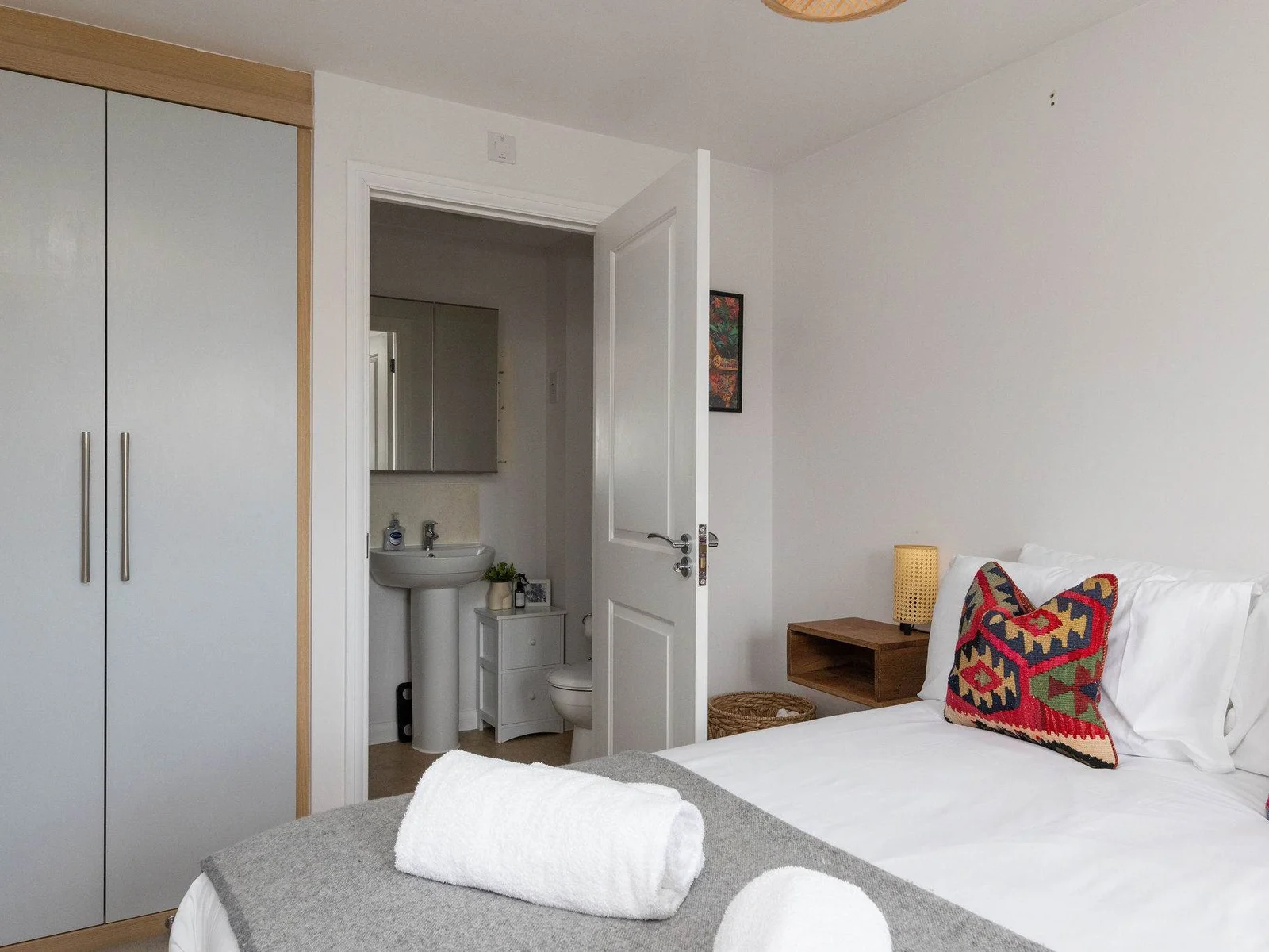 Master bedroom with wardrobe and private ensuite.
