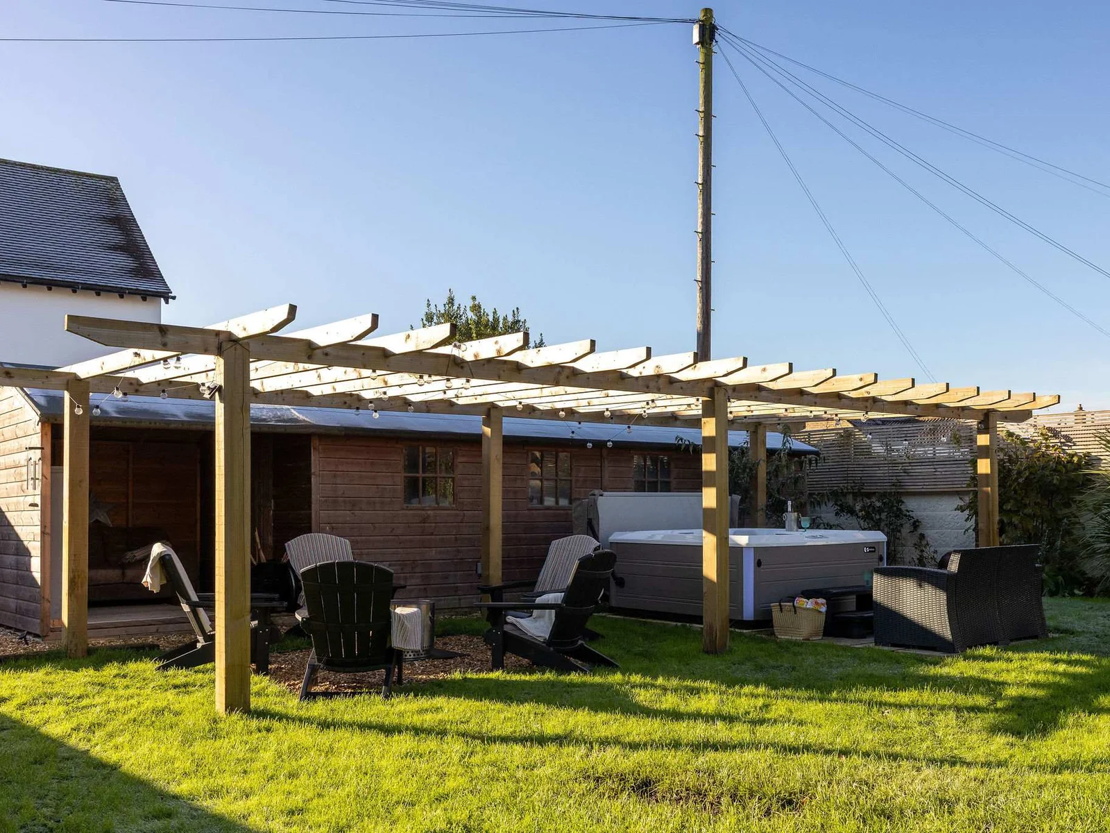 Head over the hot tub area, you will find more seating to relax
