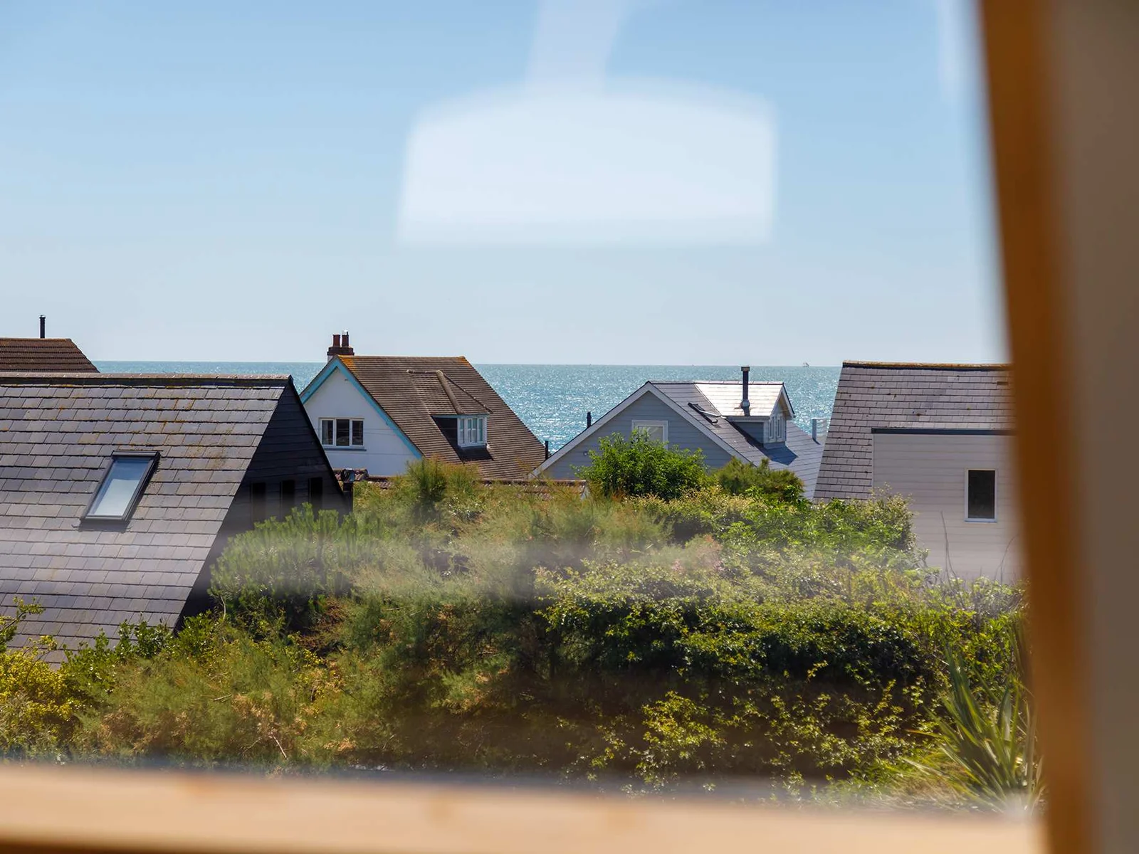 Take in the sea views while gazing through the second-floor window