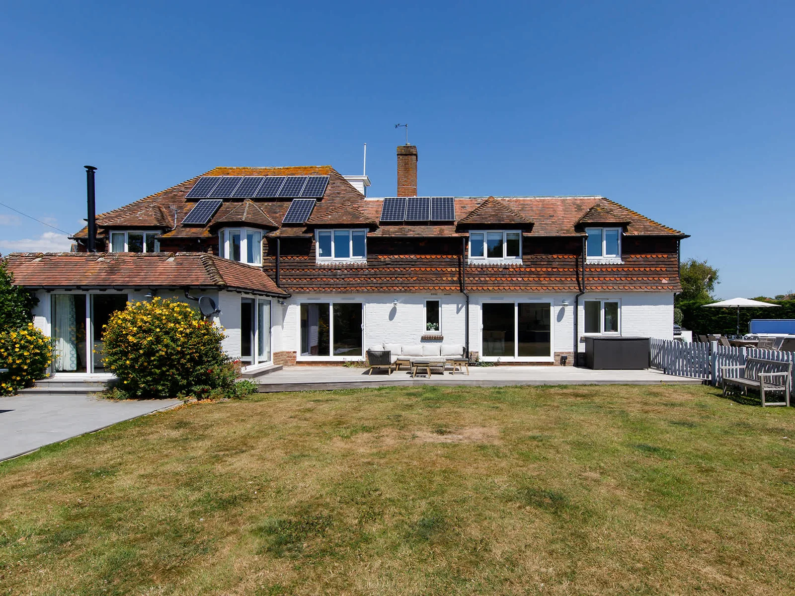 The home has a lovely garden space and decking.