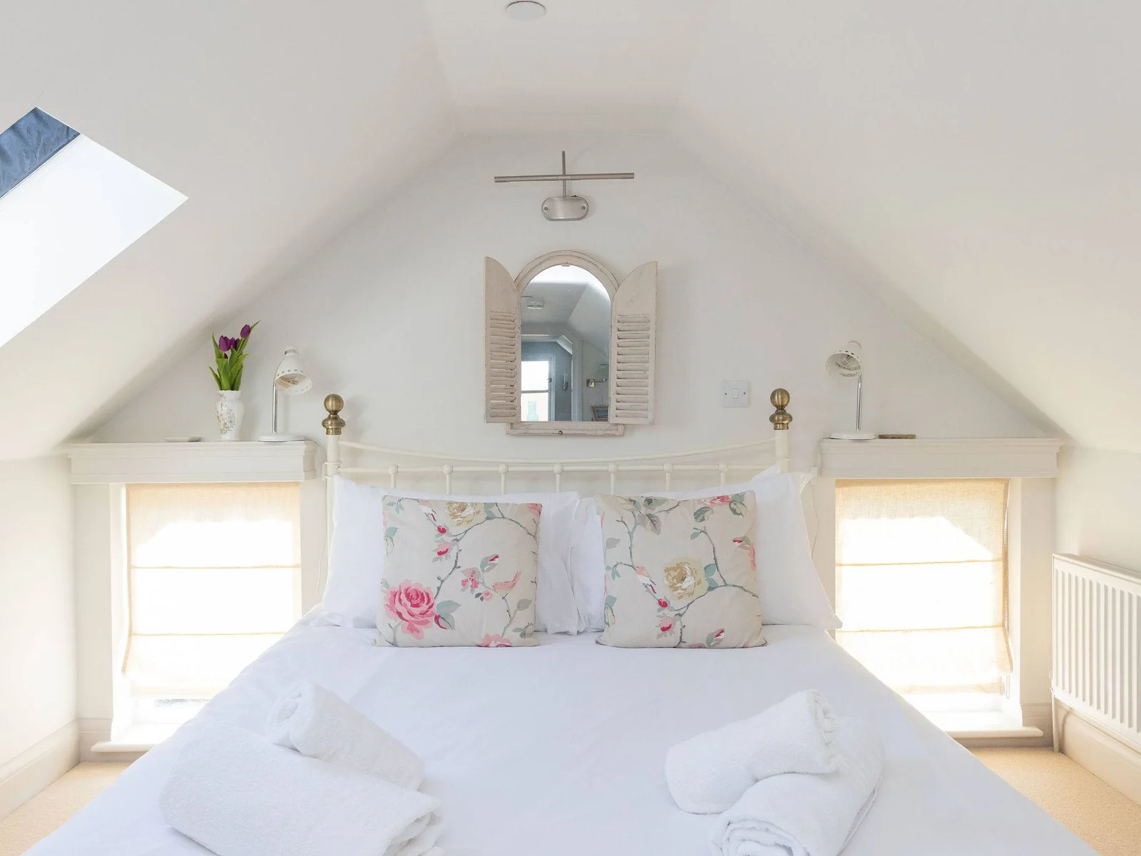 Beautifully styled loft space with calming coastal tones