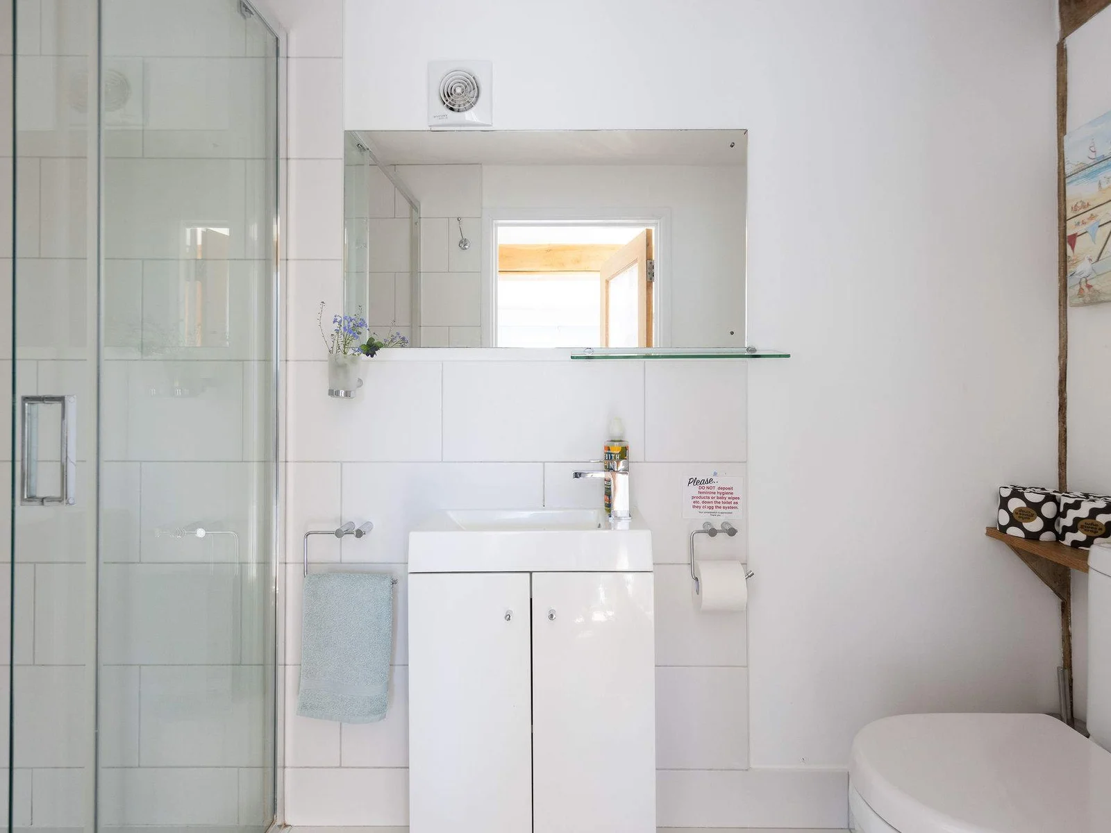 Freshen up after a day at the beach or exploring the local area, stocked with fresh towels and essential toiletries.