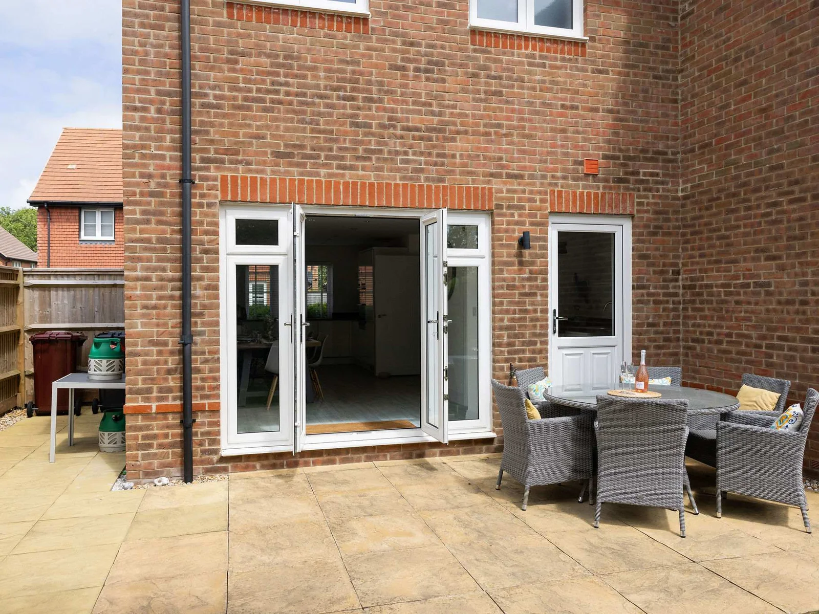 Step out from the dining room onto the patio, perfect for alfresco meals and evening drinks.