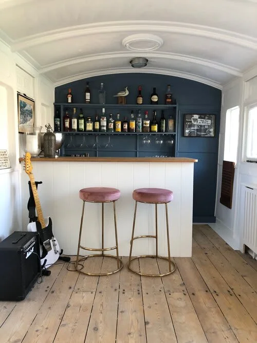 Sit at the bar and enjoy a cocktail...you are on holiday afterall!