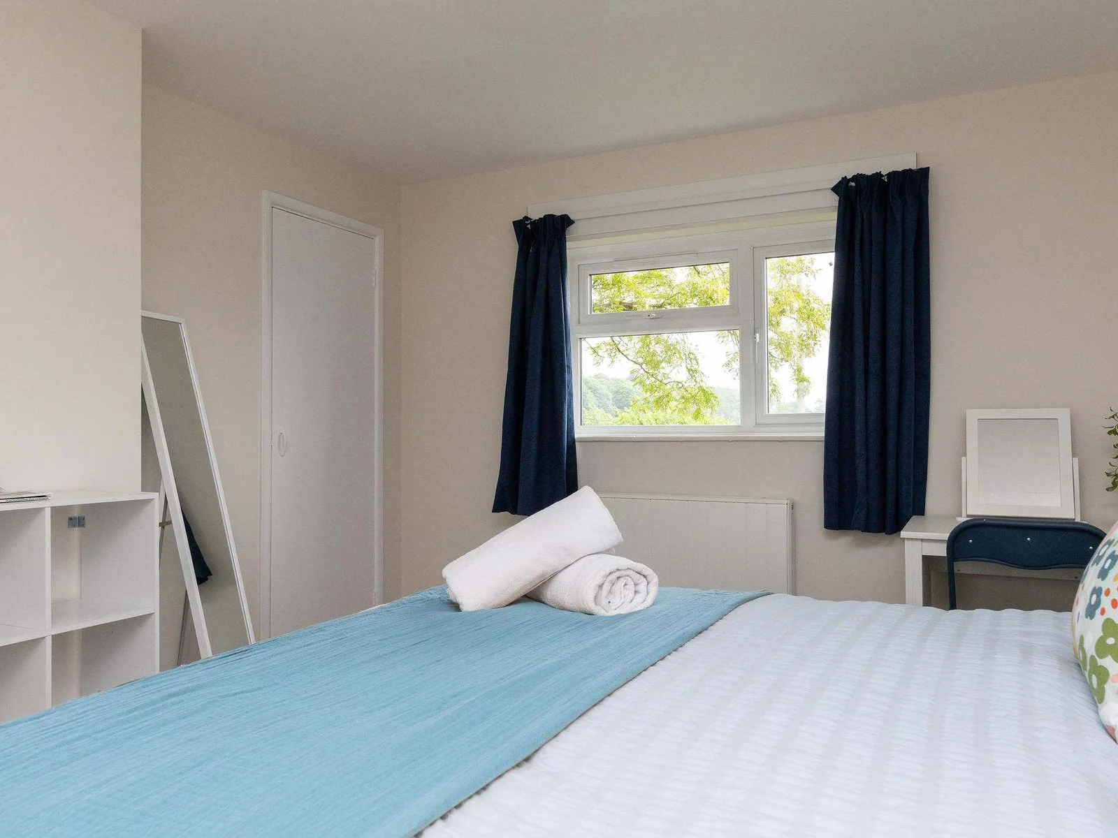 Bedroom 1 with mirror and dressing table