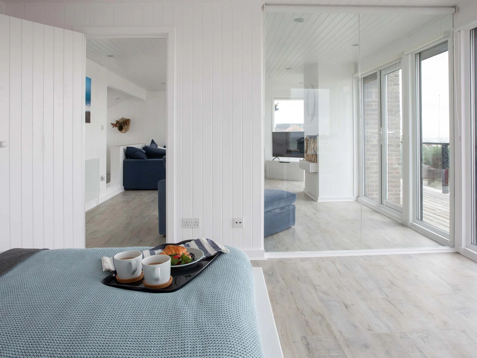 The first floor king is next to the upstairs lounge area and has direct balcony access.