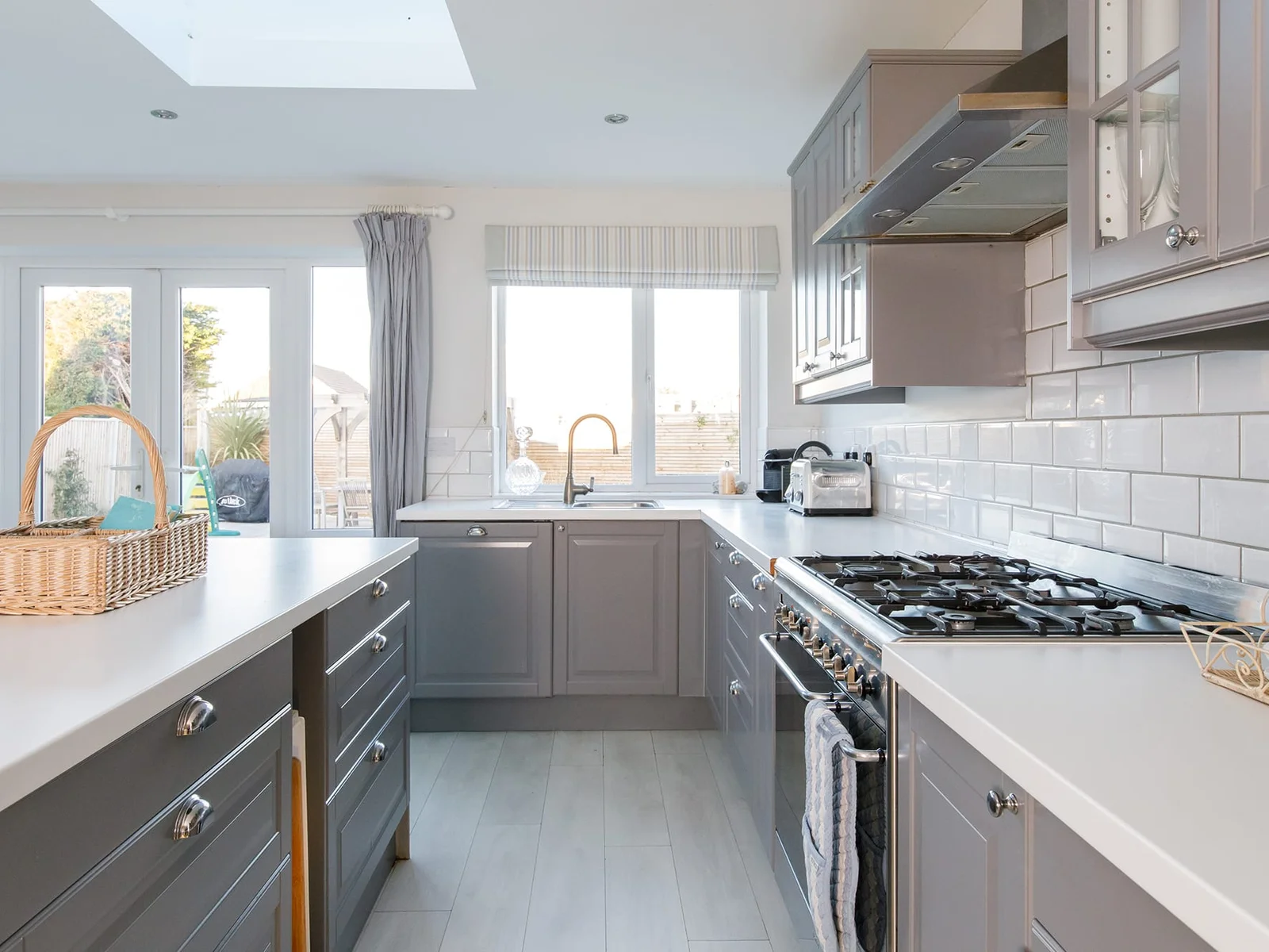 The kitchen has spacious countertops and plenty of pots and pans to cook up a storm.