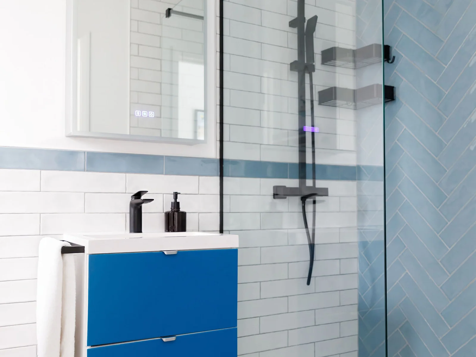The downstairs has a shower room with large walk-in shower, WC and sink.