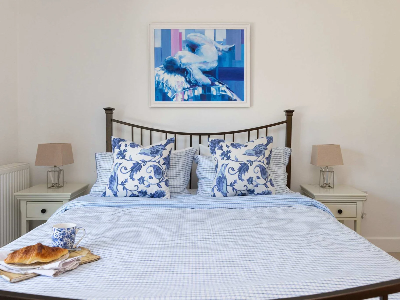 This king size bed offers ultimate comfort for a restful night's sleep.