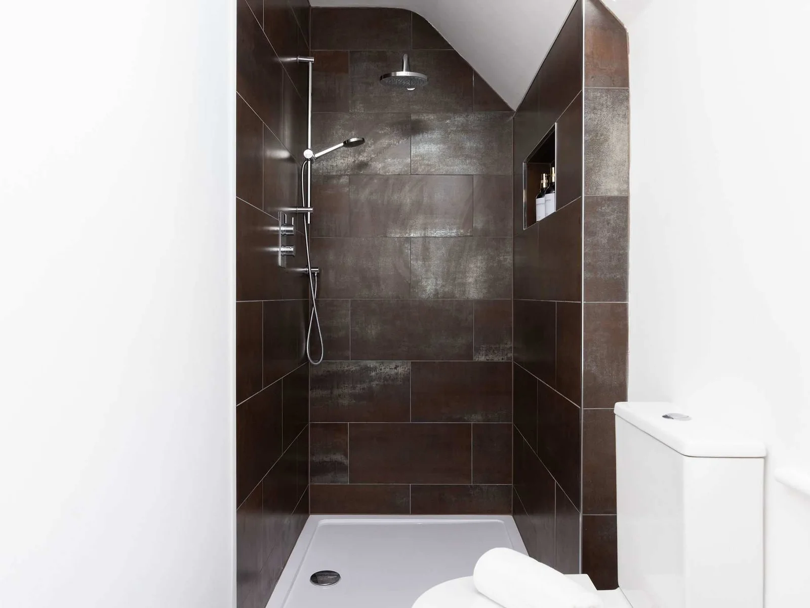 The family bathroom's second shower, perfect for busy group mornings.