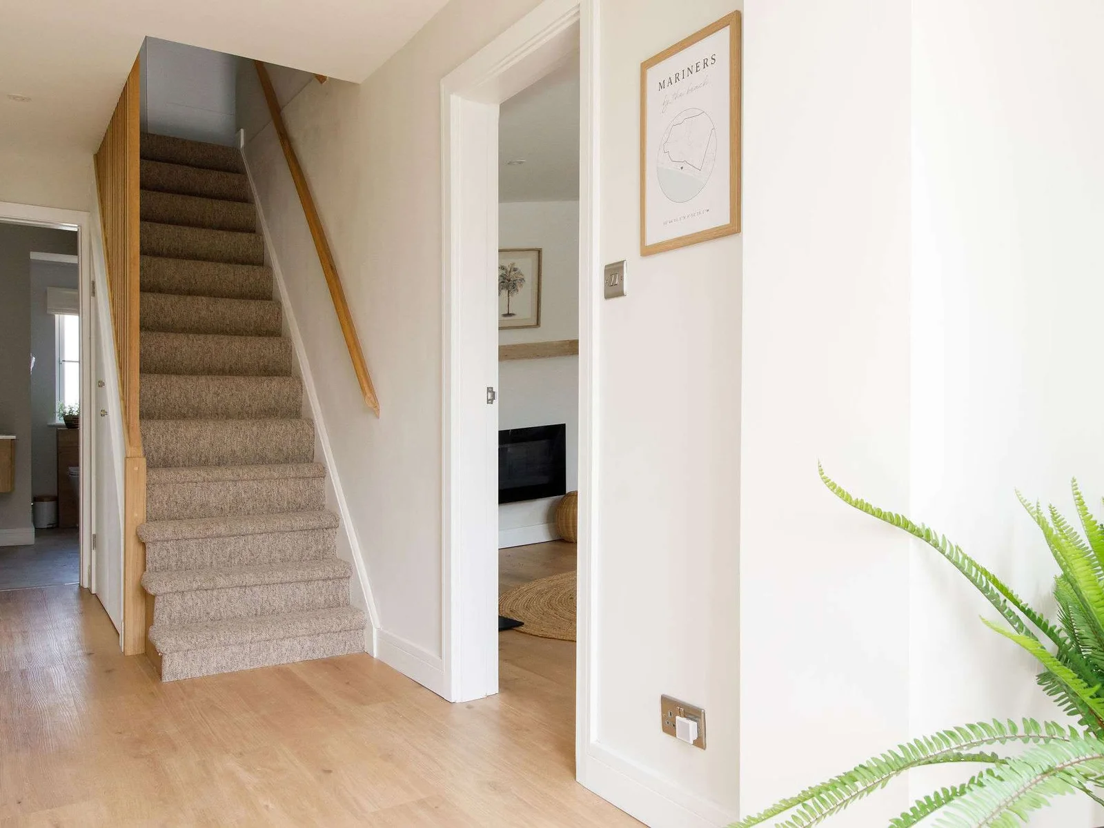 The hallway is light, bright and beautiful