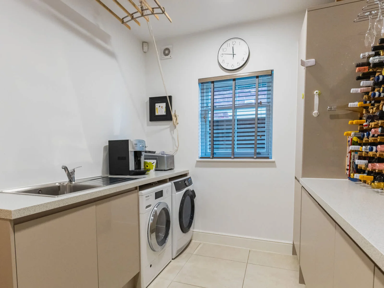 Dedicated utility room with washer, dryer and ample workspace—ideal for longer stays and family groups.