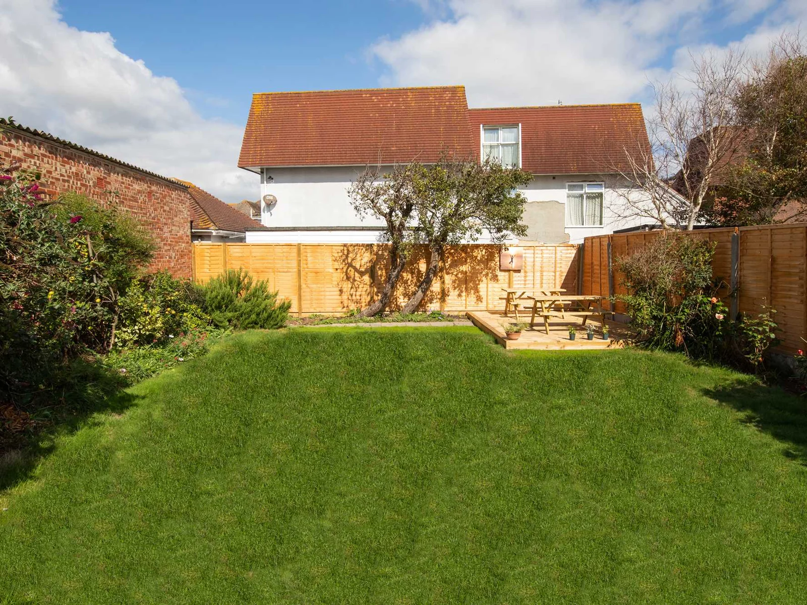 Let the kids run around the enclosed garden with plenty of space to burn off all that energy