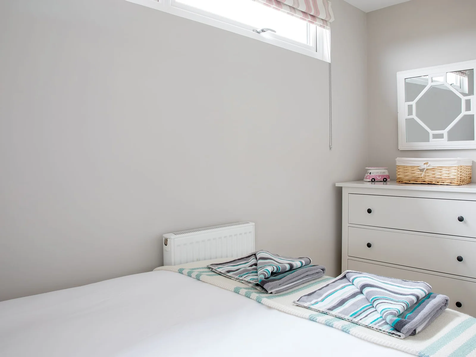 Store your clothes in the spacious dresser.