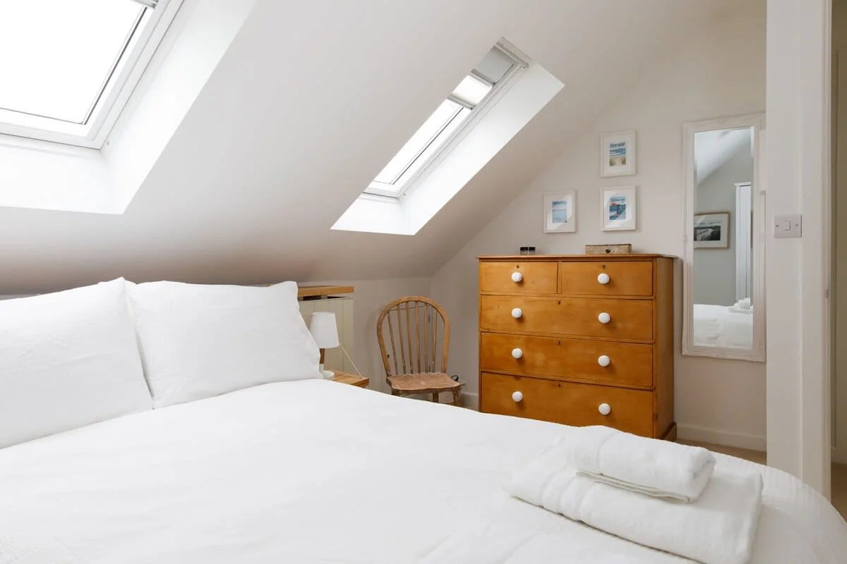 King room with draws and cupboard space.