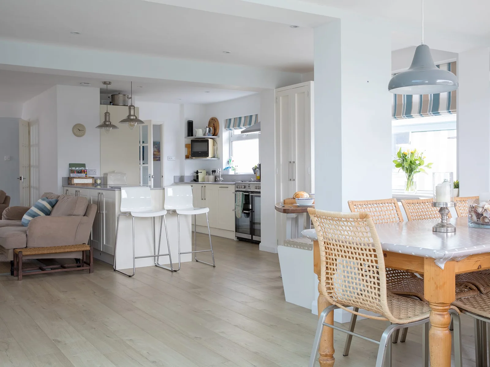 Abundance of healthy, natural light bursts through large windows.