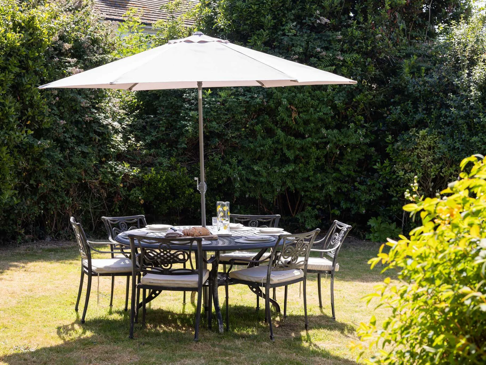 Share delightful outdoor meals in the private, sunny garden of our coastal holiday home.