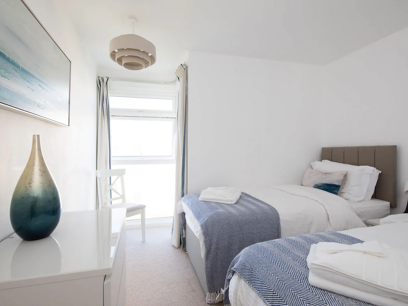 The two singles zip together to make another king size bed if you want!