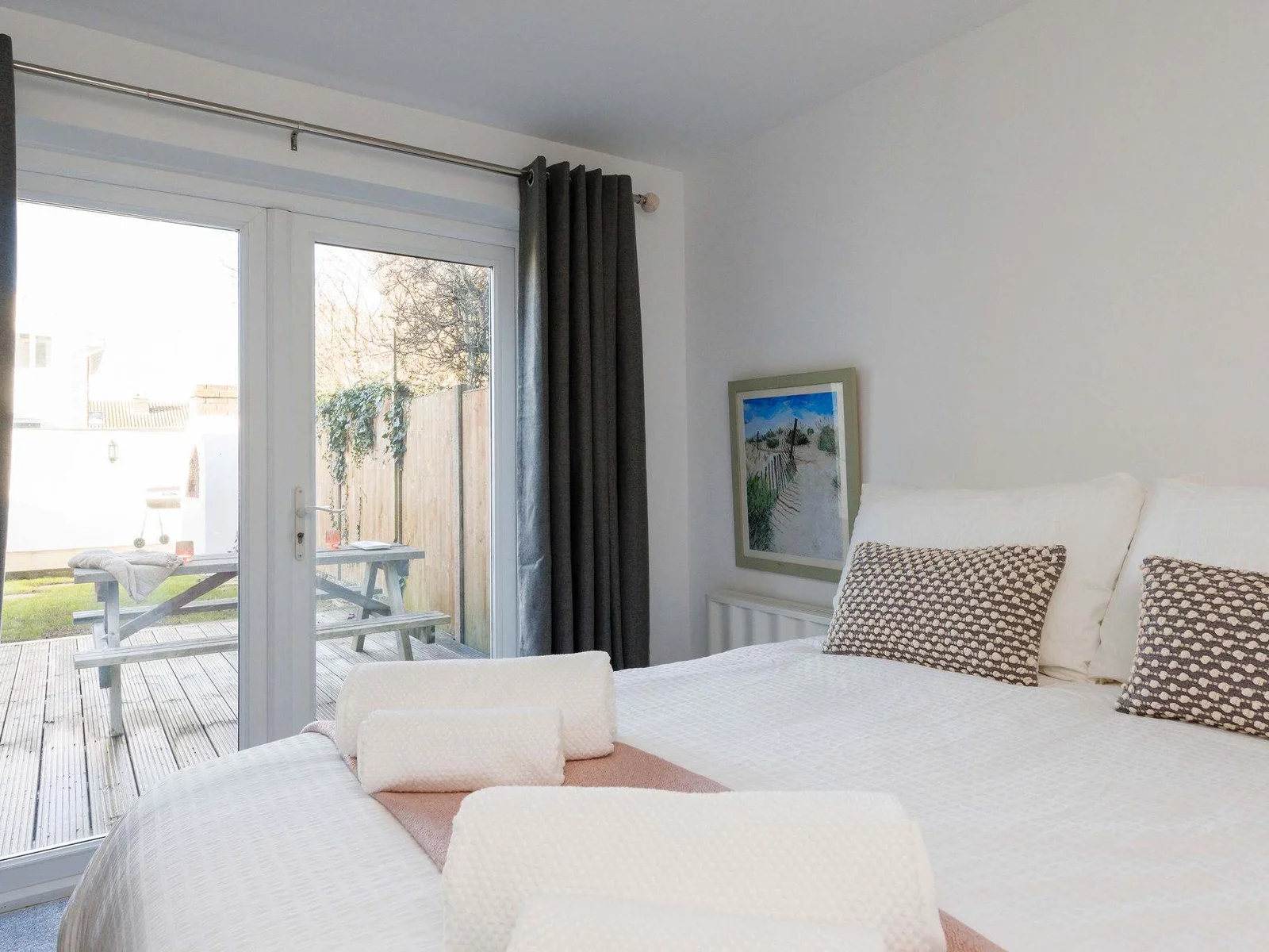 Bright and airy bedroom with direct garden access