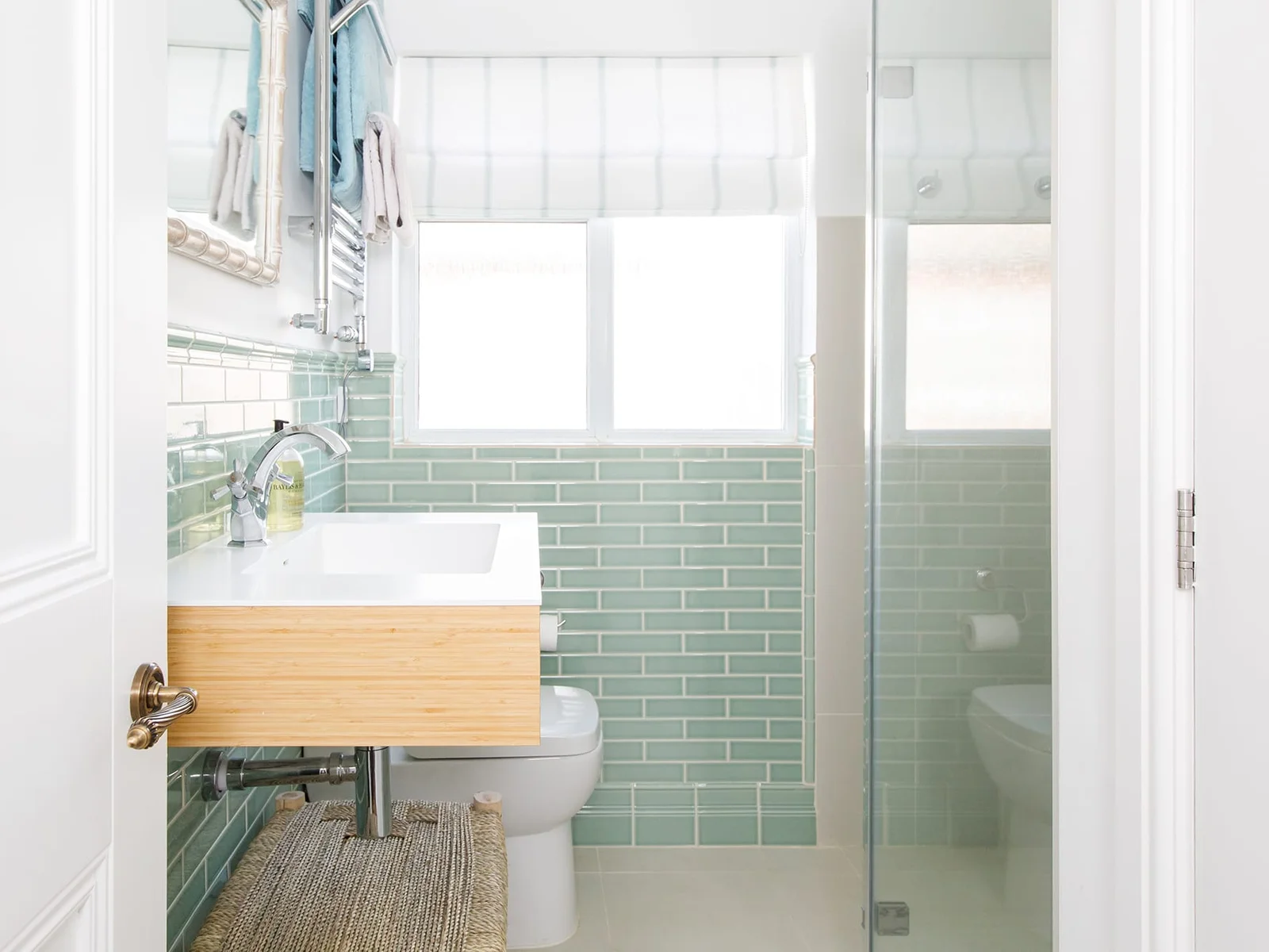 The bathoom has a large walk-in shower, sink and WC.