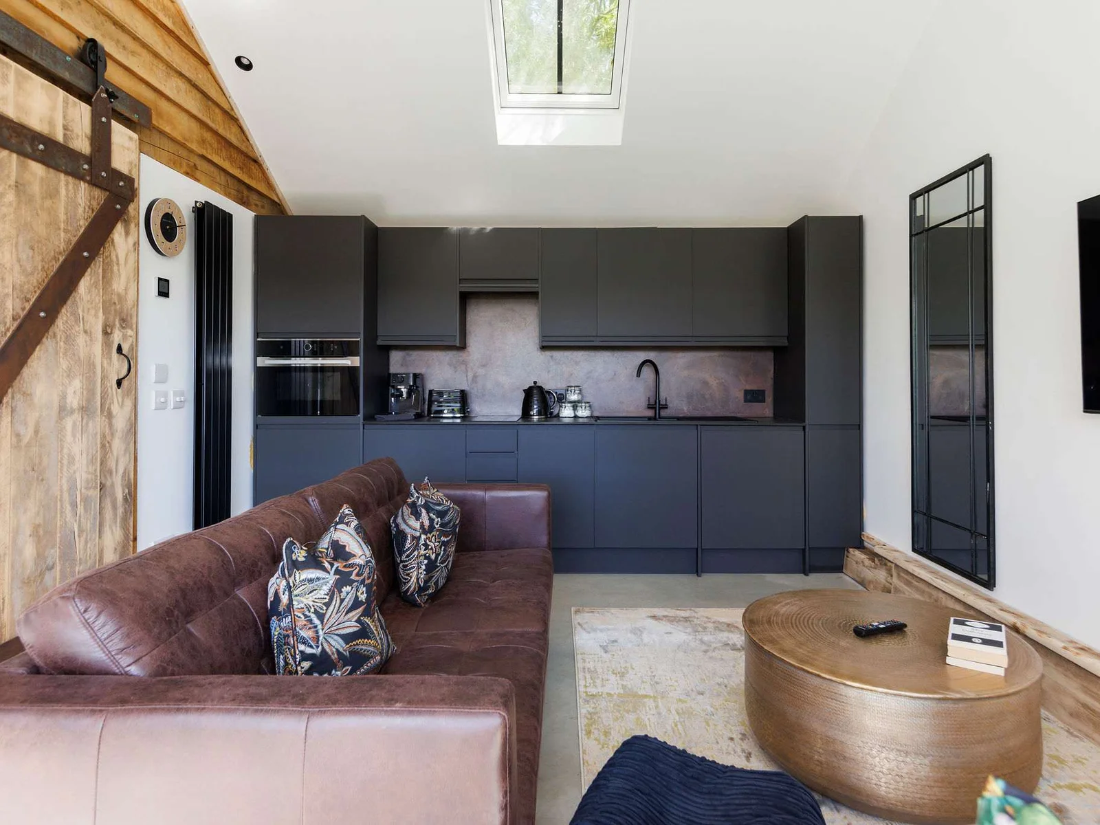 The main living space cleverly combines the kitchen with living and dining.